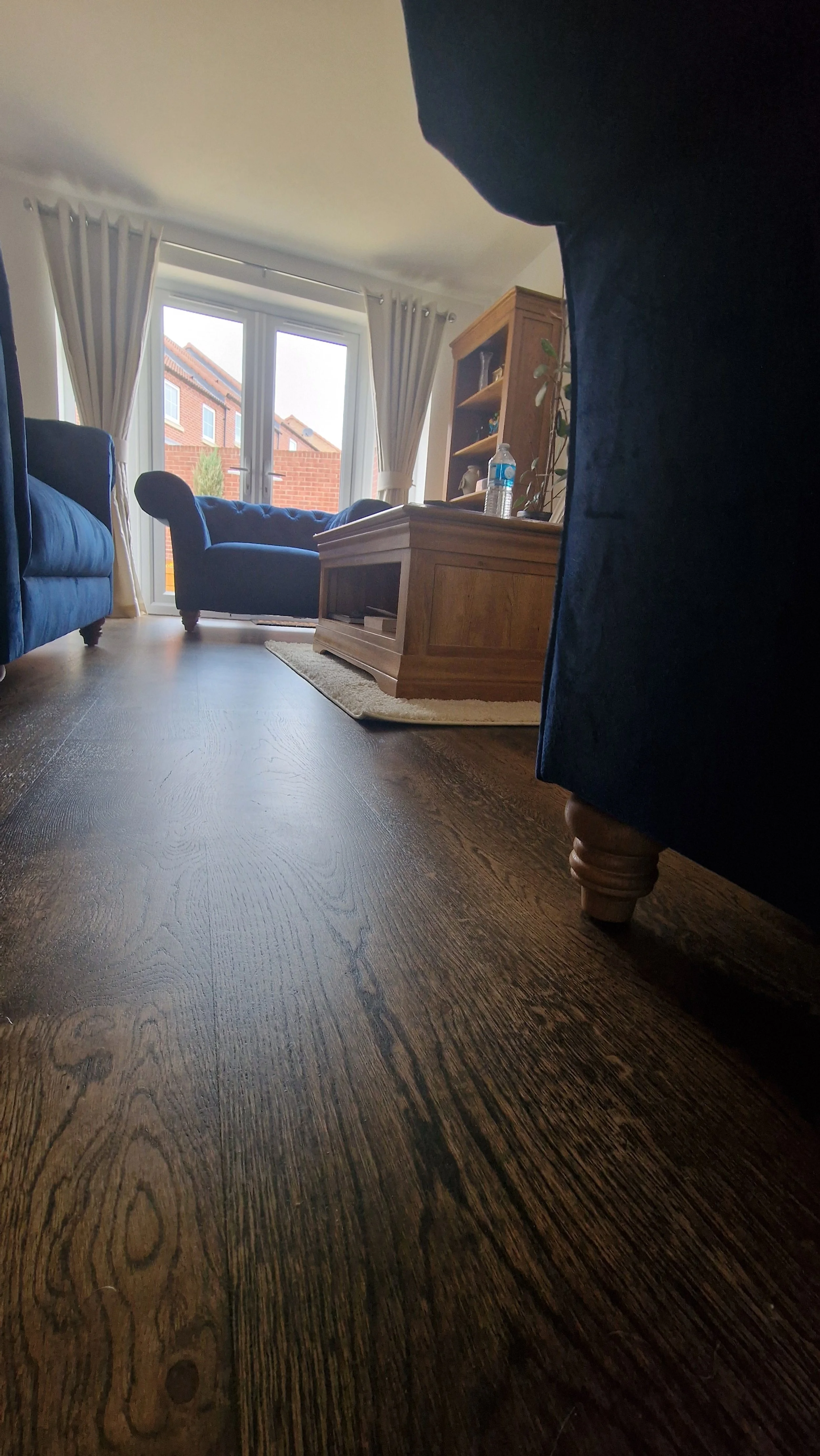 Dark oak flooring in a living room area
