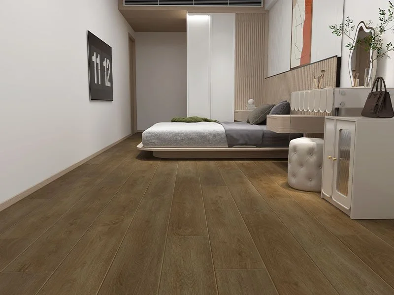 Olympus Pro 7.0 Apollo Oak Smoked SPC plank flooring fit out in a bedroom
