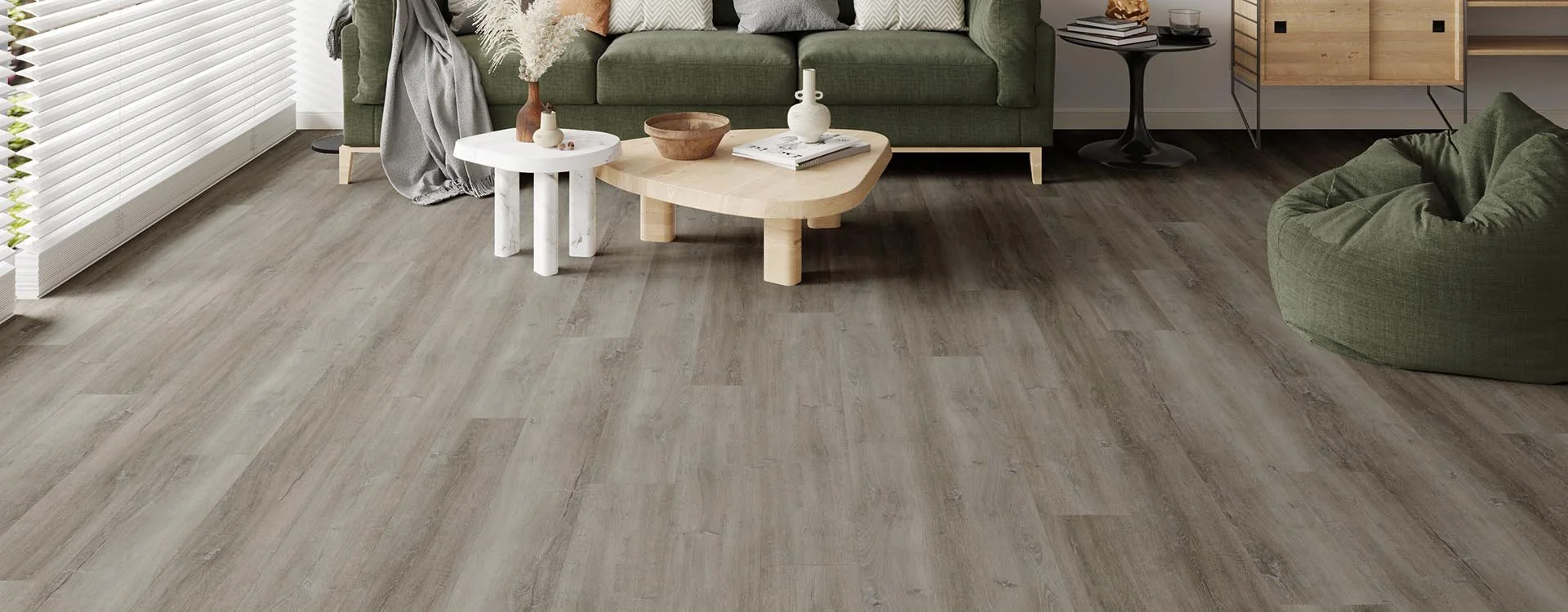 Firmfit Original Soft Ash Grey Oak SPC click plank flooring installed in a lounge
