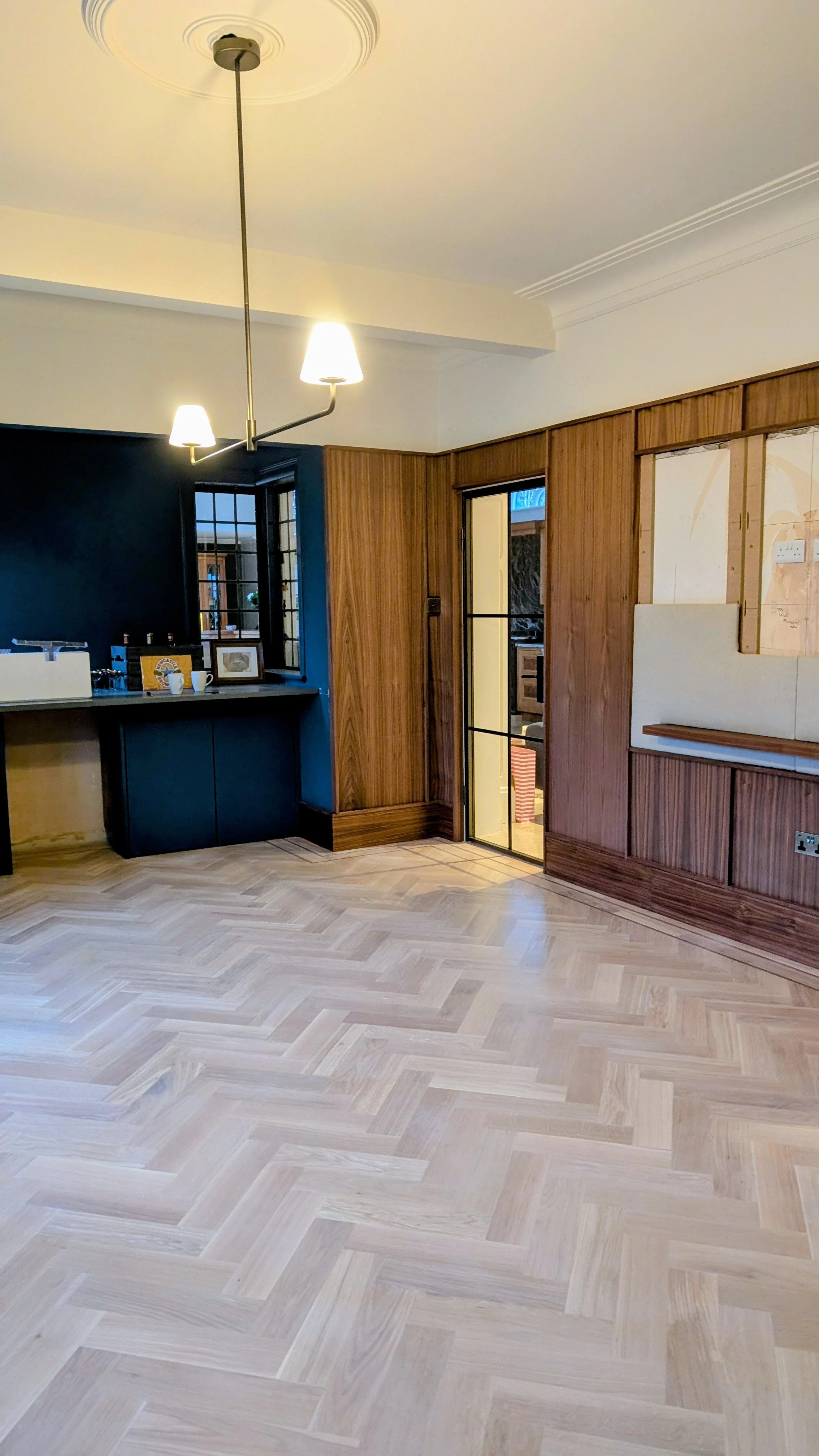Unfinished herringbone in a games room