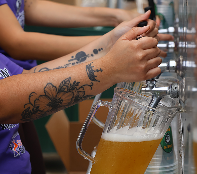 Filling a pitcher with craft beer