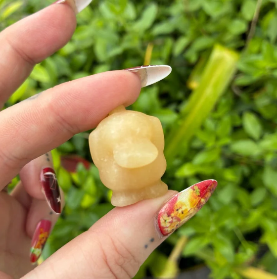 Orange Calcite Psyduck Carving