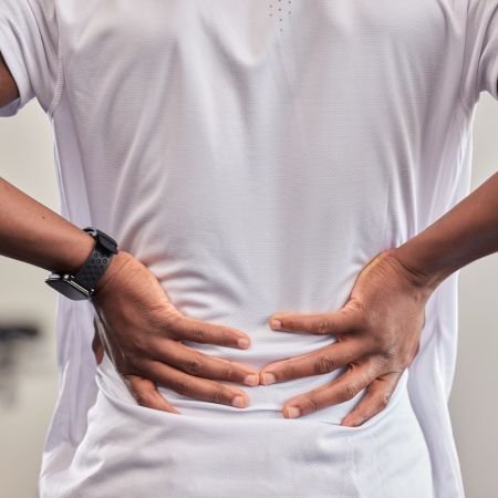 Man seeking lower back pain relief