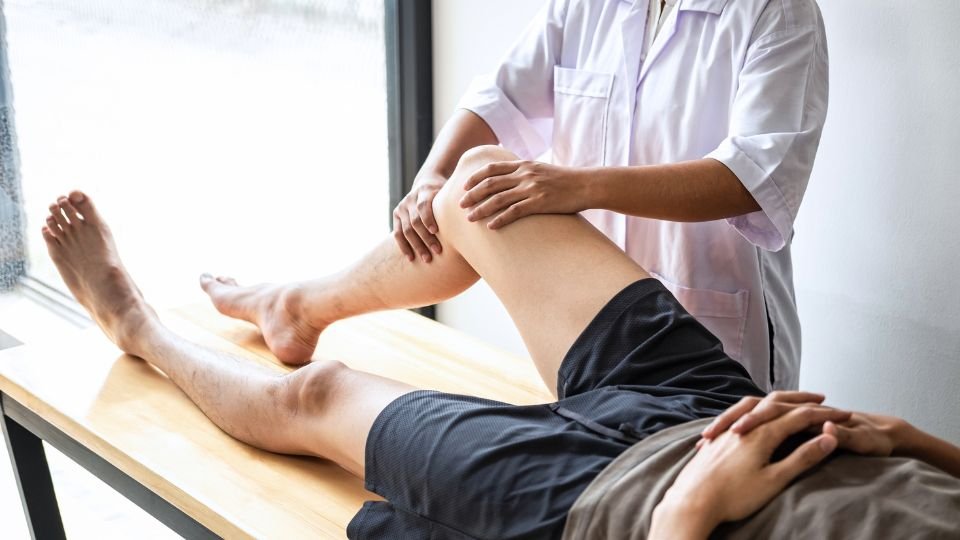 Man at physiotherapy for sciatica pain relief