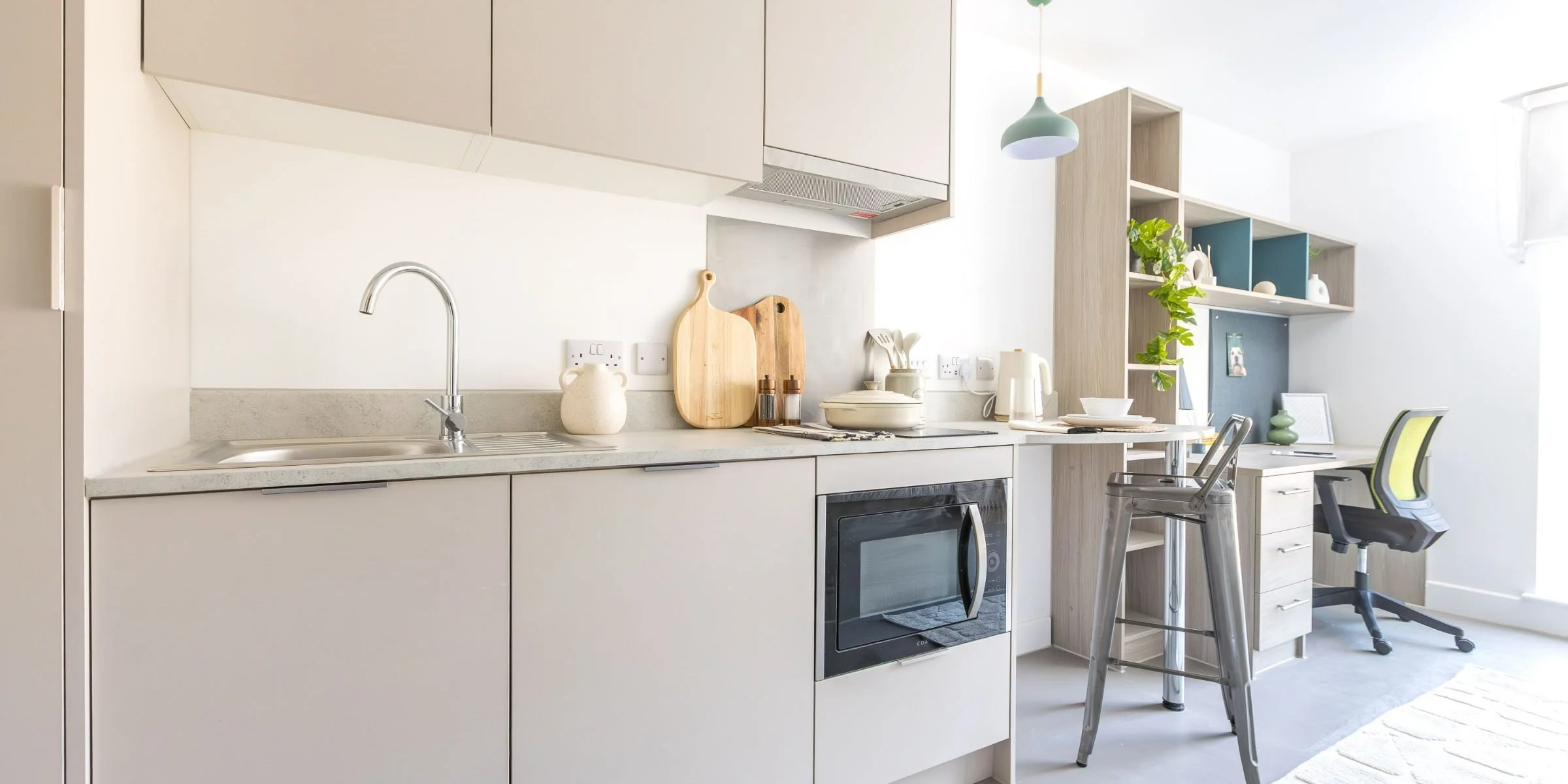 Bespoke fitted kitchen within a Timber Yard Bristol student studio apartment, designed to maximise space, functionality and durability.