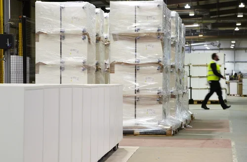 Deanestor storage facility housing furniture ready for scheduled project delivery and installation.