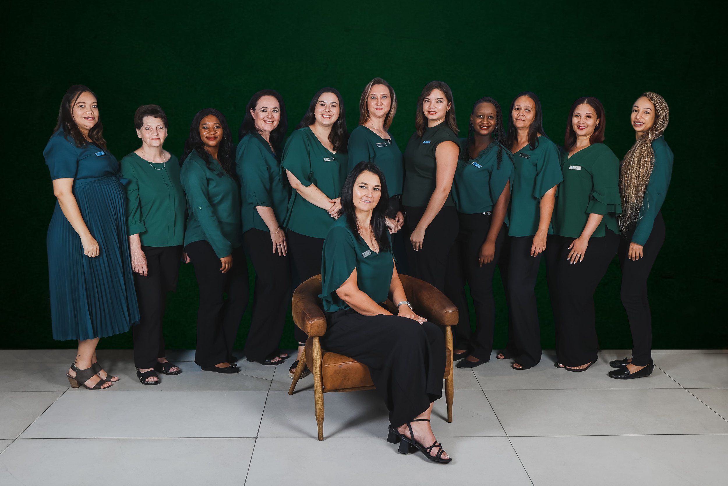 Group of admin ladies in green and black