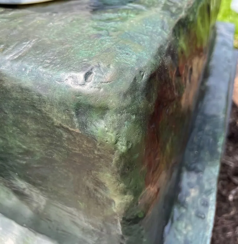 Inpainting on outdoor sculpture to restore