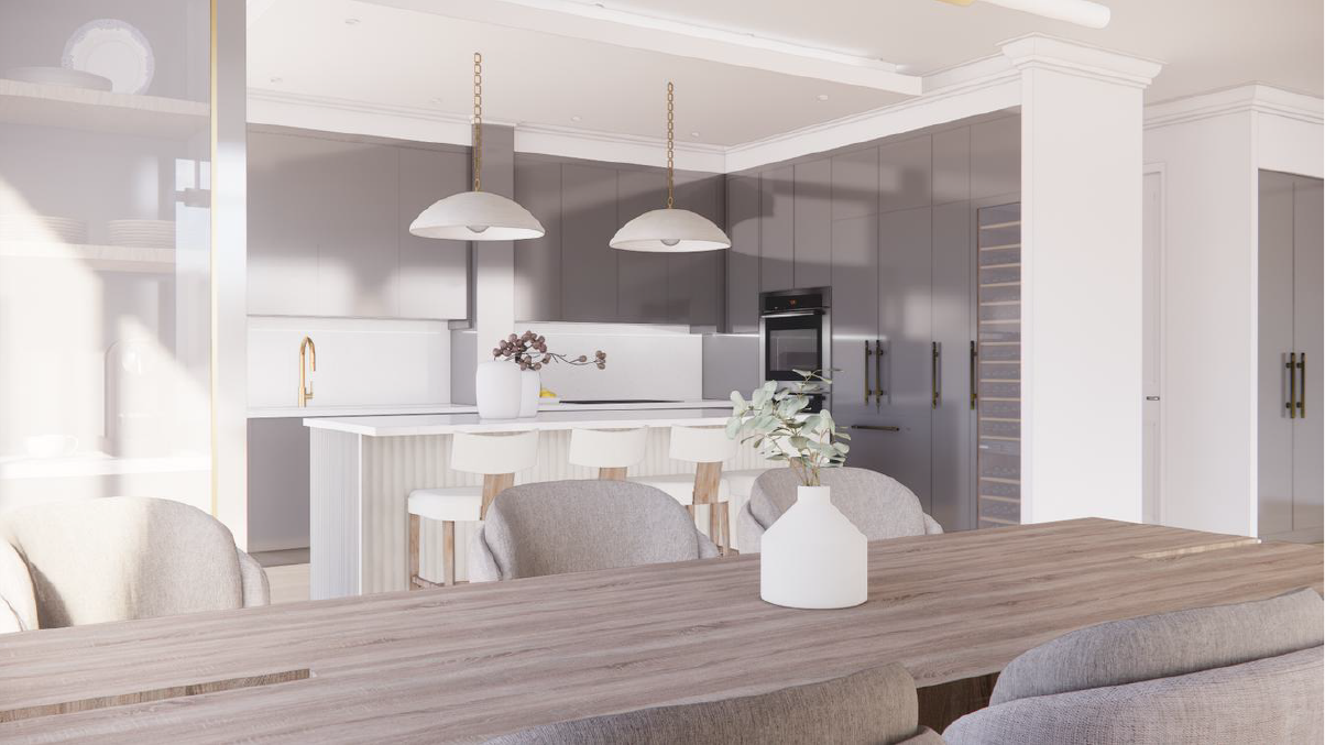Modern kitchen with gray cabinets, white countertops, a white kitchen island with stools, pendant lights, and a wooden dining table with a white vase and decorative plant.