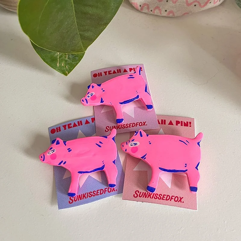 pinbadges_0007_pigs.jpg