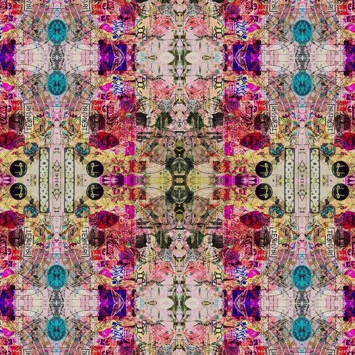 A vibrant, symmetrical abstract collage featuring colorful elements including flowers, geometric shapes, and various textures with pink, purple, blue, yellow, and black accents