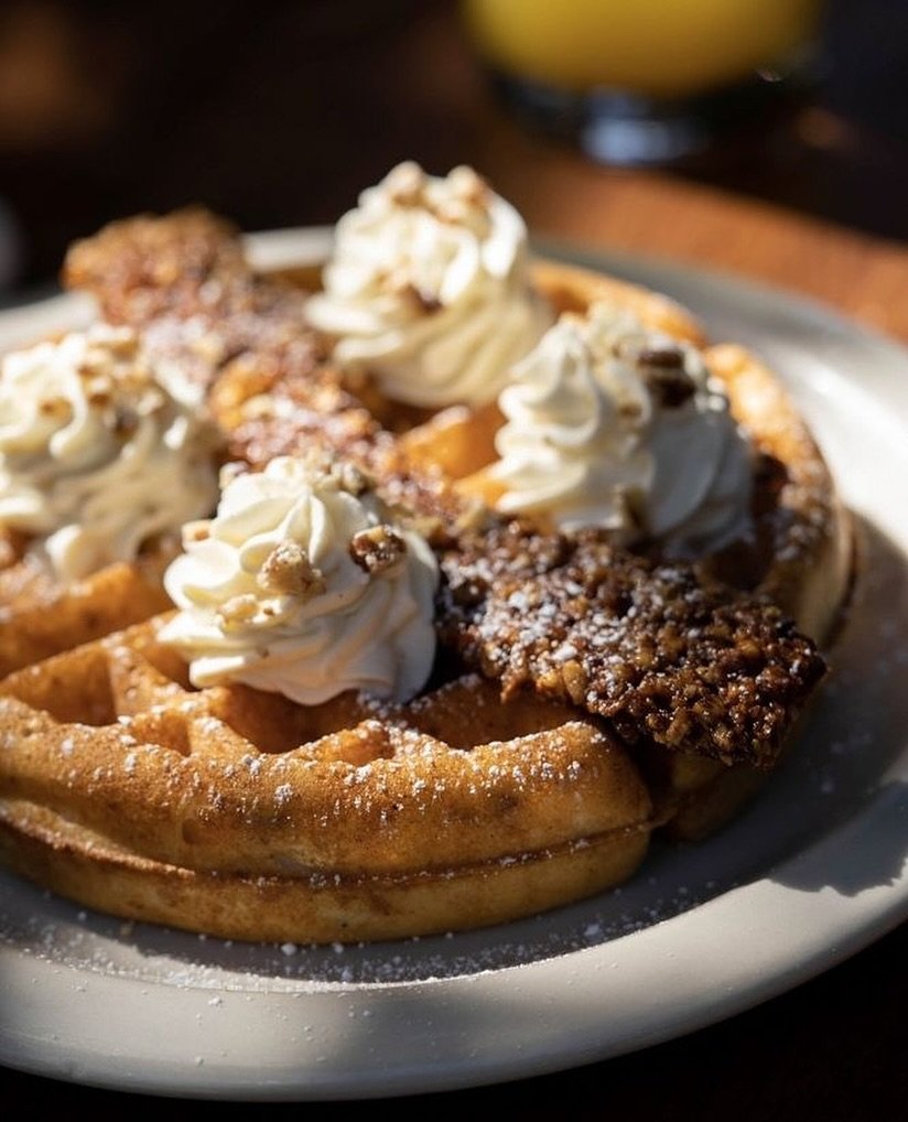 Praline Waffle 🧇 loaded with our signature praline bacon baked into a light, yeast-raised waffle, topped with a strip of praline bacon, whipped cream, and toasted pecans. Available until 2 PM at our Eastside location!⁠
⁠
#screendoorpdx #pdxfood #por