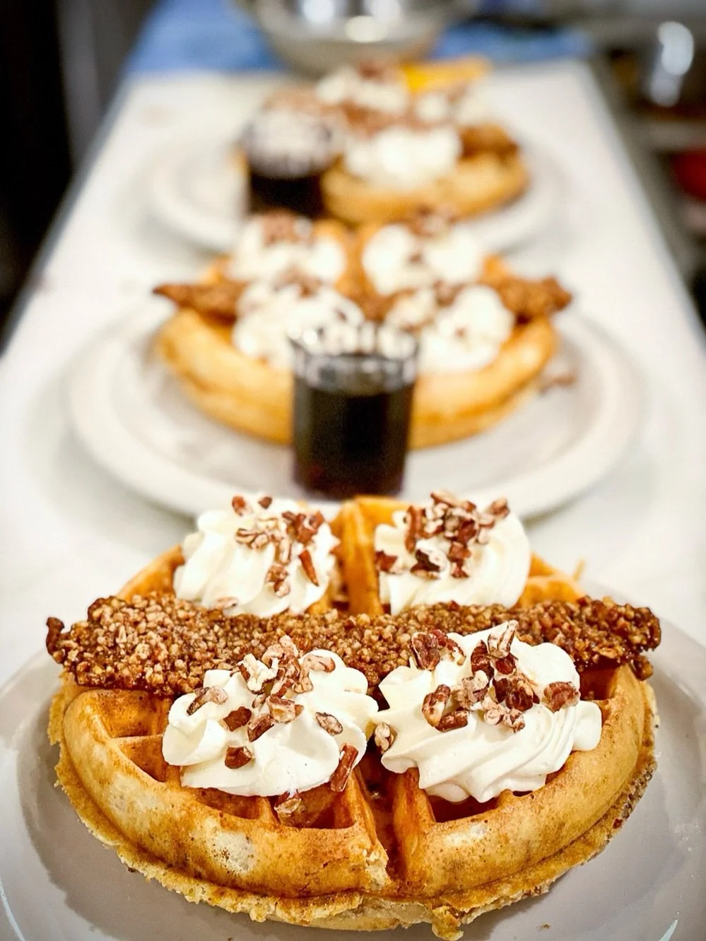 The first day of Fall 🍂 calls for Praline Waffle loaded with our signature praline bacon baked into a light yeast-raised waffle topped with a strip of praline bacon, whipped cream, &amp; toasted pecans 😍⁠
⁠
#screendoorpdx #pdxfood #portlandfood #tr