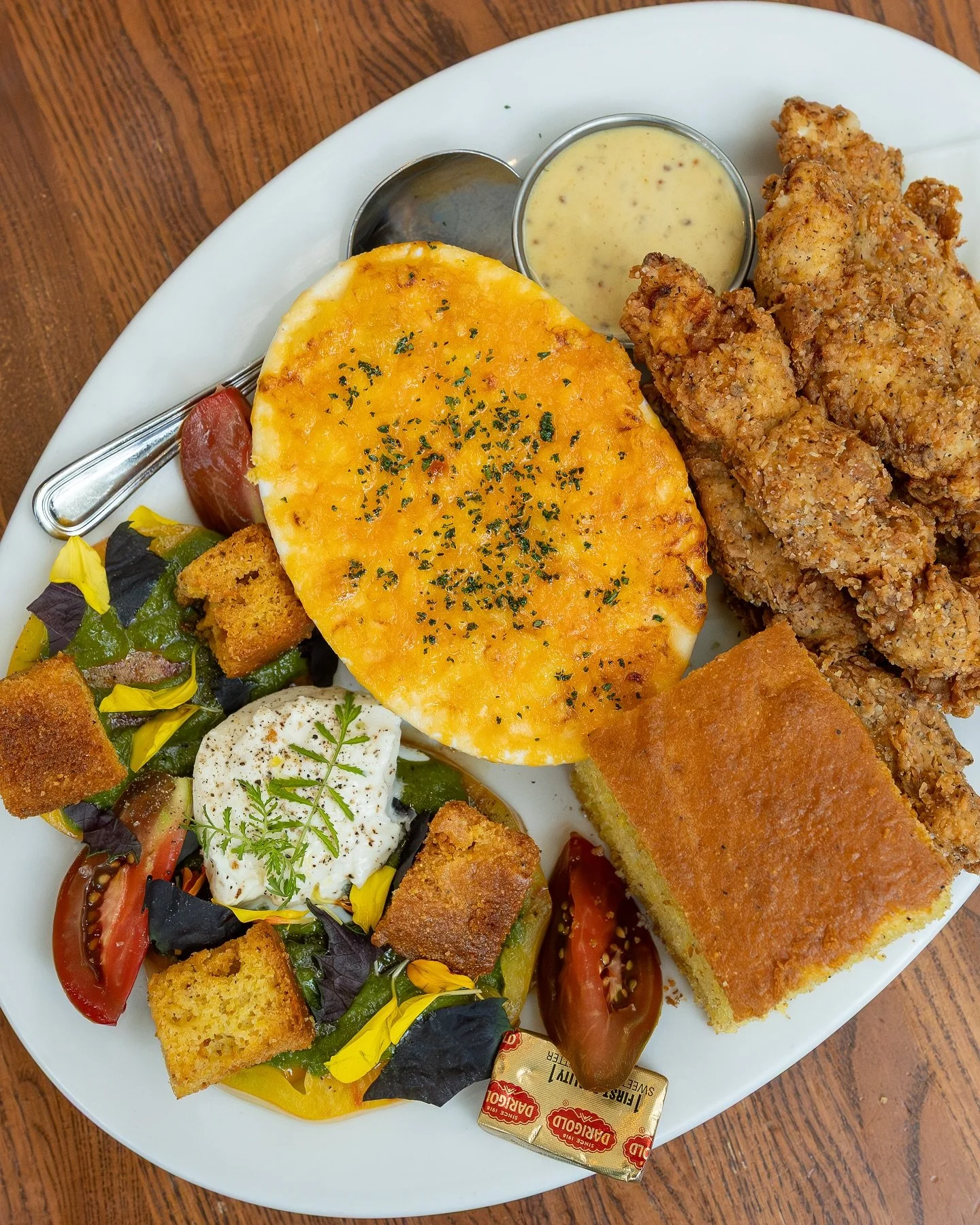 Build your own Screen Door Plate for dinner! A great way to get a little taste of what we offer. Choose any 3 items from our seasonal veggies and sides menu, like  mac &lsquo;n&rsquo; cheese, BBQ baked beans, crispy catfish, chicken tenders, warm cor