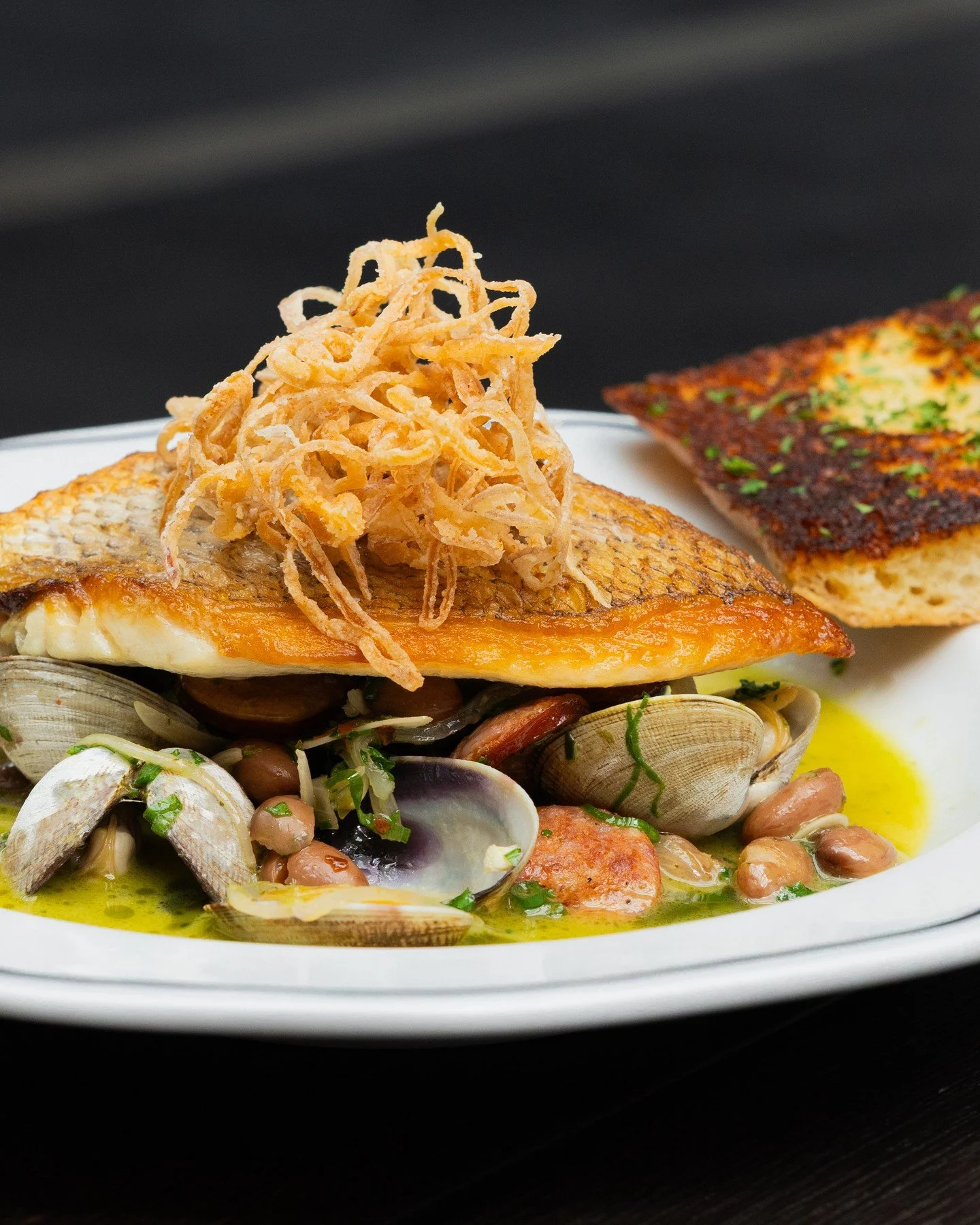 Fresh seasonal dishes now on our dinner menu ✨⁠
⁠
Pan Roasted Red Snapper with Clams⁠
with andouille sausage, shelling beans, white wine wild ramp butter sauce &amp; griddled garlic bread⁠
⁠
Blistered Snap Peas⁠
with green goddess labneh, spring onio