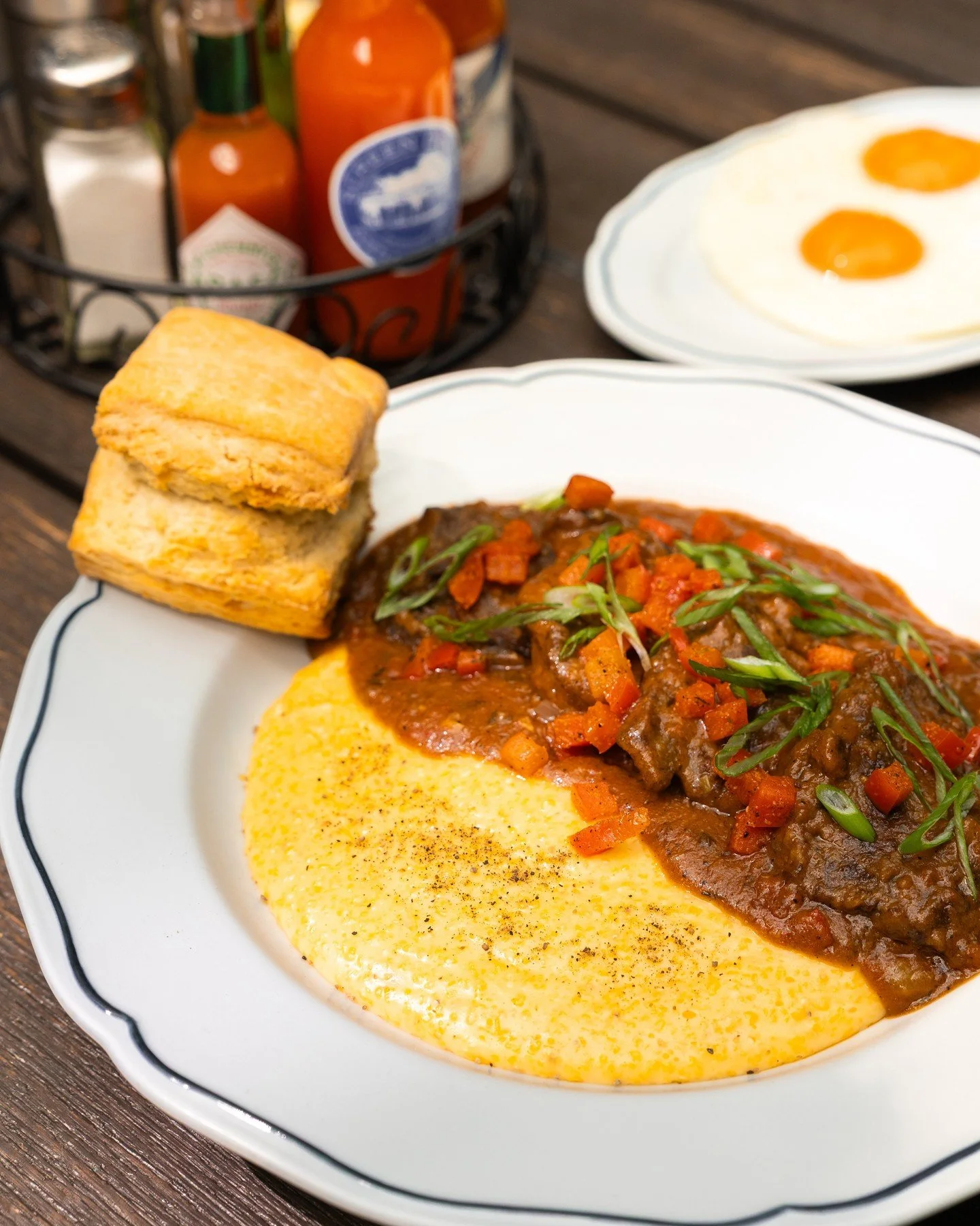 Now serving at our Burnside location: Grits &amp; Grillades with tender Wagyu Denver steak, slow-braised in a rich Creole sauce and served over cheddar Marsh Hen Mill stone-ground grits with two over-easy eggs and a flaky buttermilk biscuit.⁠
⁠
Avail