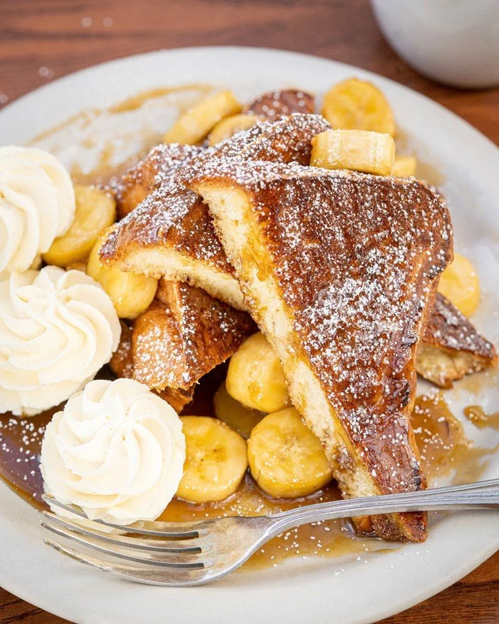 Not your average French toast 🤤⁠
⁠
Bananas Foster French Toast with griddled brioche, rum-flamed caramelized bananas, cinnamon, and whipped cream.⁠
⁠
This one&rsquo;s personal. Nicole worked at Brennan&rsquo;s, where Bananas Foster was born, and Dav