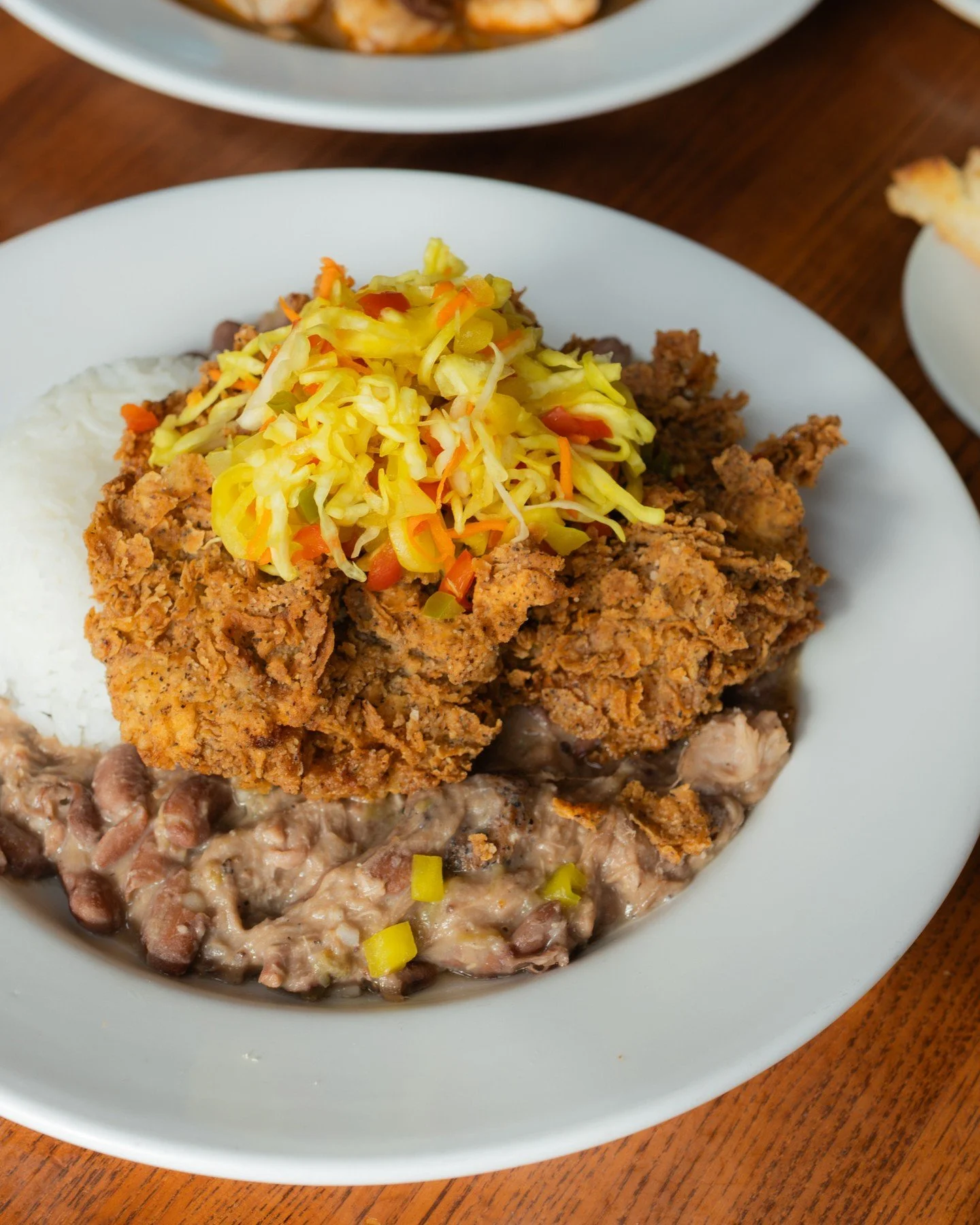 Go-to favorites, always on the menu, from New Orleans Red Beans &amp; Rice with fried chicken to Creole Seafood Gumbo. Come see us this week for dinner, we&rsquo;ll have these ready for ya!⁠
⁠
#screendoorpdx #pdxfood #portlandfood #travelportland #ex
