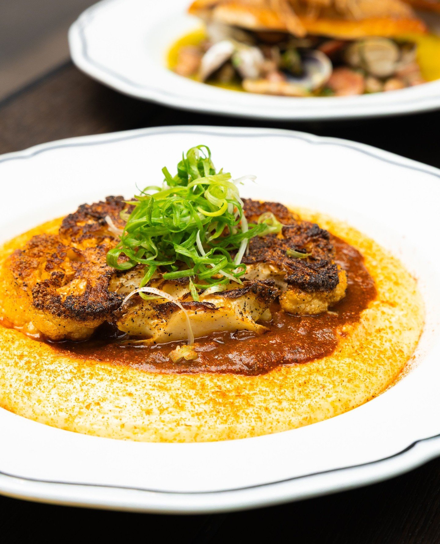 Our seasonal dinner menu is always shifting and right now it has some real favorites on it. For example our cast iron Blackened Cauliflower Steak comes with Marsh Hen Mill cheese grits, scallions, and roasted red pepper creole sauce. Worth stopping i