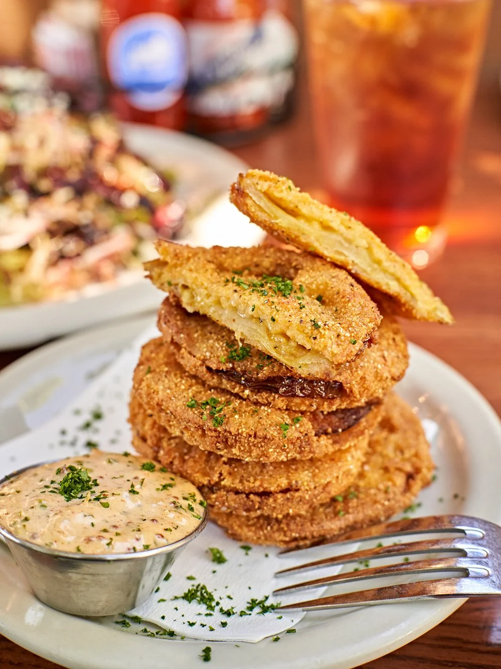 The wait is over! 🤩 Golden, crispy Fried Green Tomatoes have returned to our dinner menu. Cornmeal-breaded local green tomatoes served with our house remoulade.⁠
⁠
Come by this week and get your hands on 'em. They're only here for a limited time.⁠
⁠