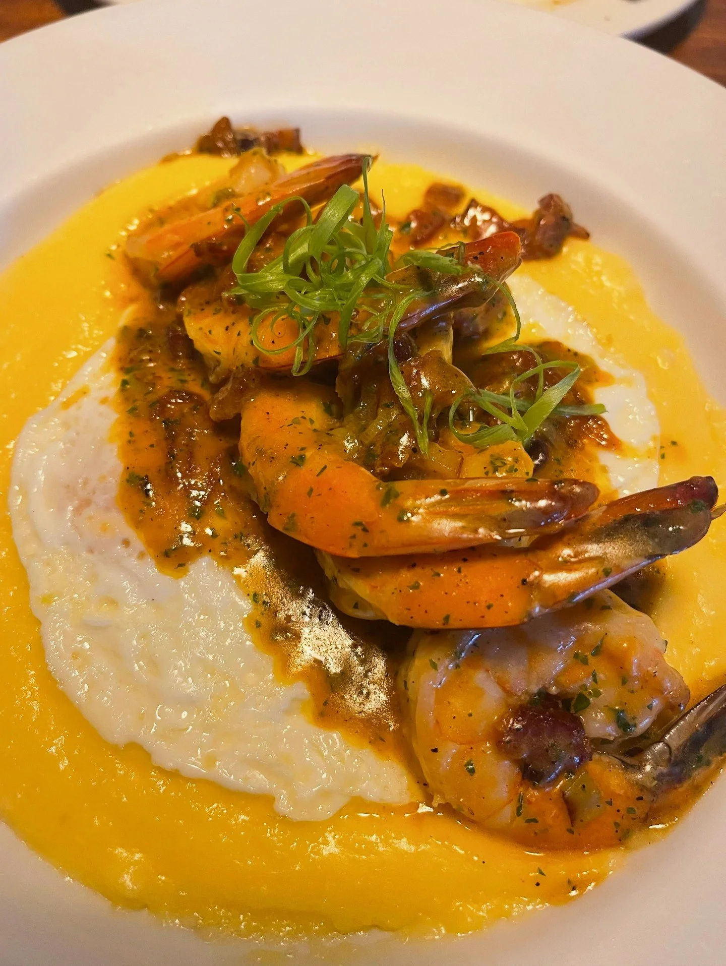 It can&rsquo;t always be Chicken &amp; Waffles&hellip; someone&rsquo;s gotta hold it down for the Lowcountry Shrimp &amp; Grits, and @daveshouseoffood gets it! Five jumbo shrimp sauteed in our signature tomato-garlic shrimp sauce with smoky bacon, se