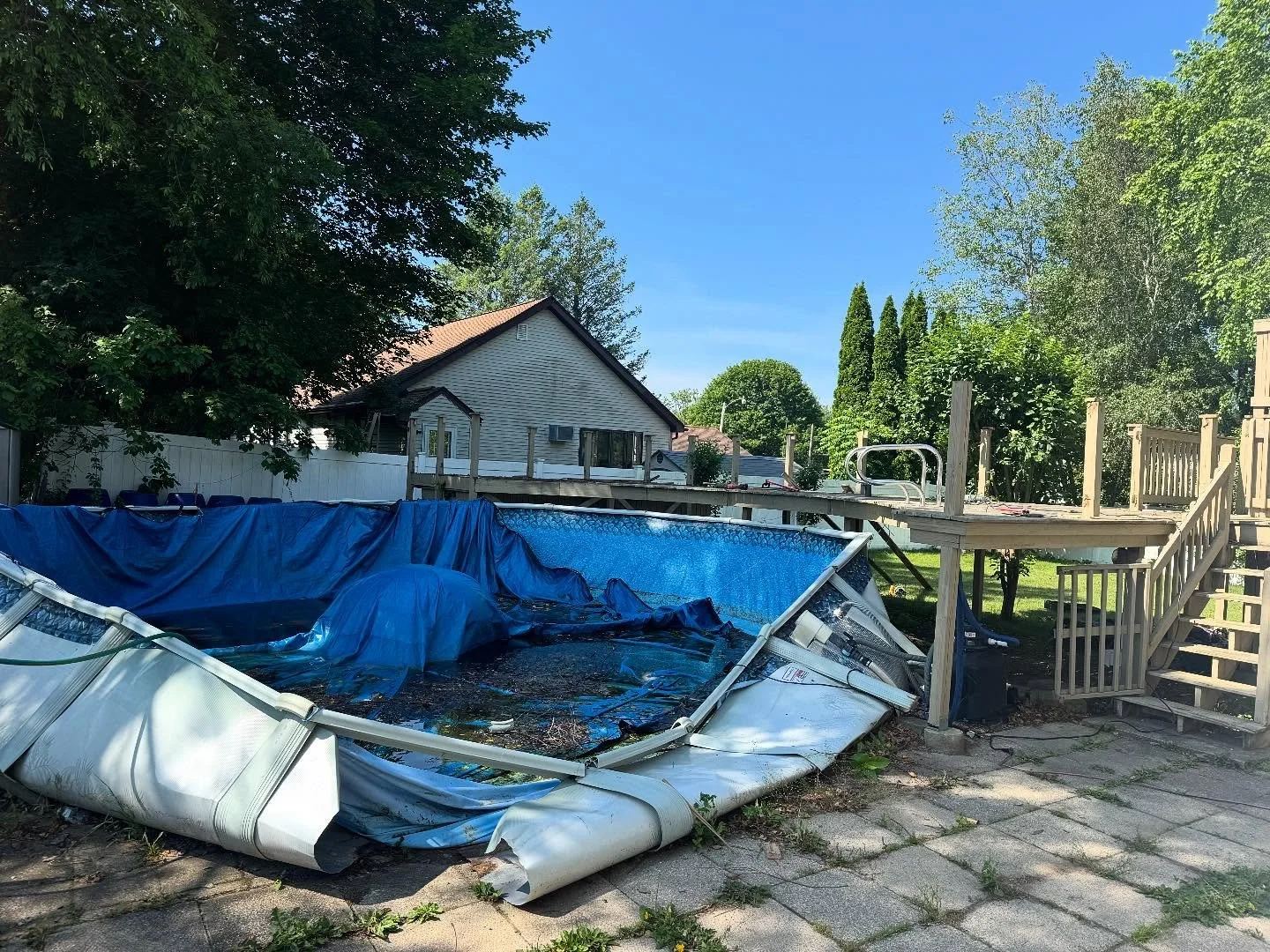 Just wrapped up a full pool and deck demo in Worcester, MA 💪🌿 Not only did we remove the old structure, but we also filled in and leveled the ground beneath the pool with screened loam to prep it for new grass and a fresh start. 

The deck stairs w