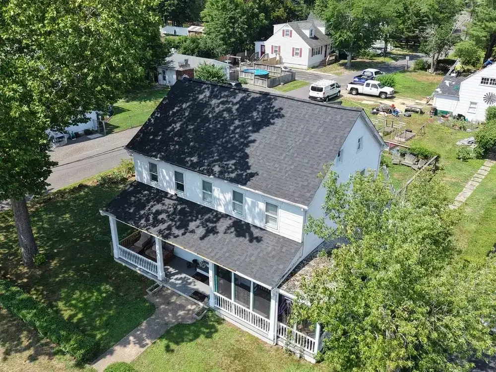 GRM Roofing crew working on a commercial flat roof in Ocean County, NJ