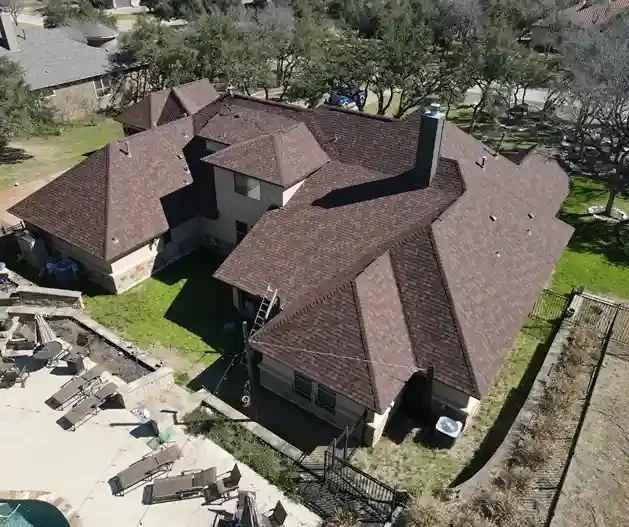 Completed storm and wind damage roof repair on a large residential home in Ocean County, NJ by GRM Roofing