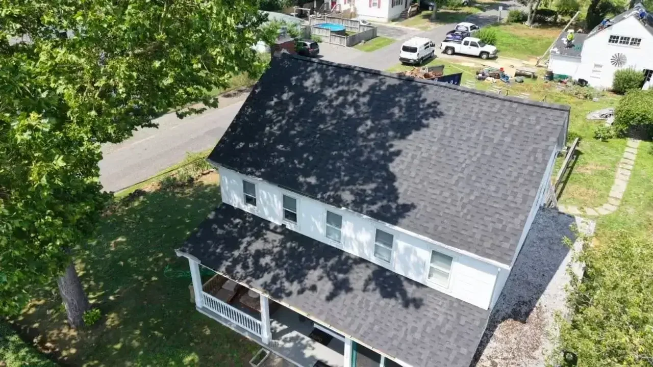 GRM Roofing team completing a roof repair project in Barnegat, NJ