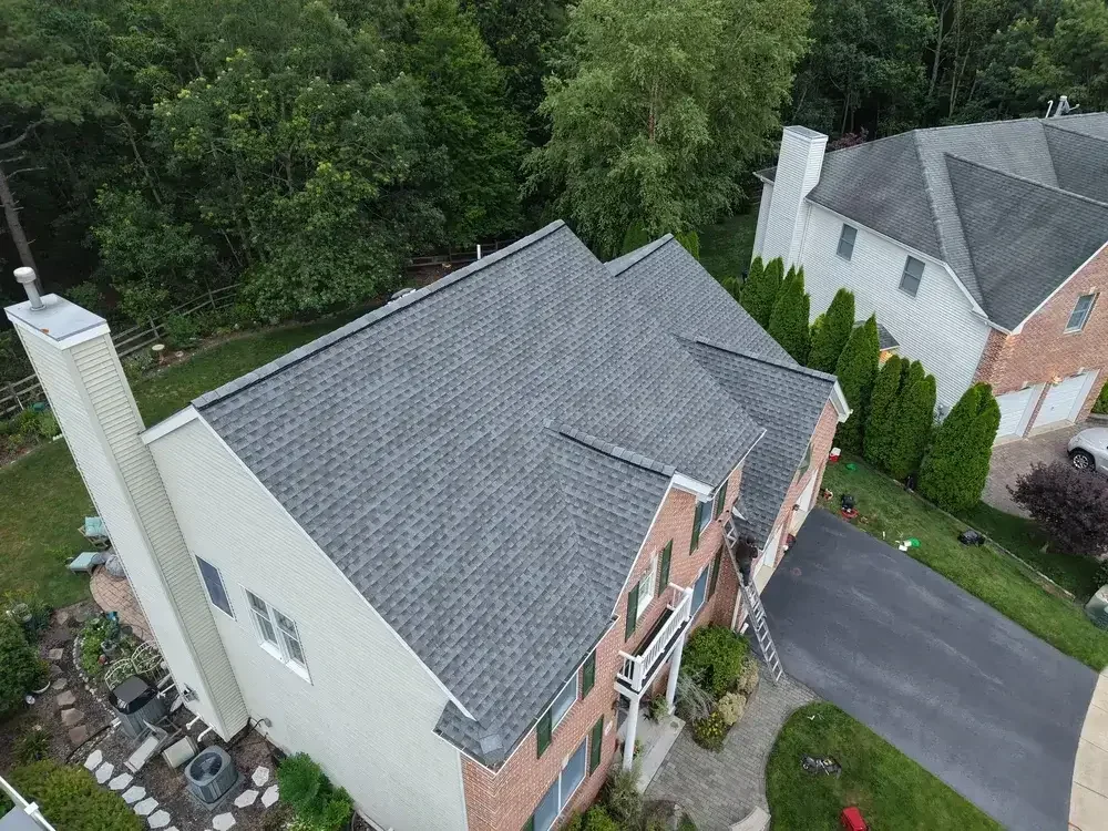 Professional roof installation in progress on a residential property in Ocean County