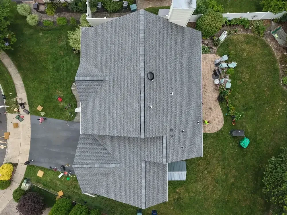 Emergency roof repair in progress on a home in Ocean County, NJ by GRM Roofing