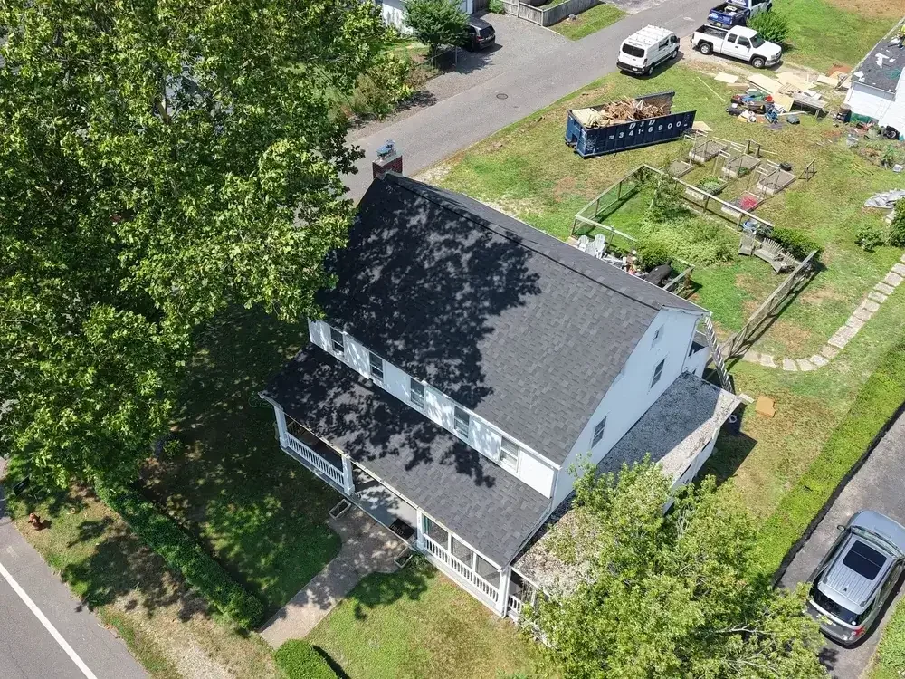 GRM Roofing specialist sealing flashing as part of preventive roof maintenance in Ocean County