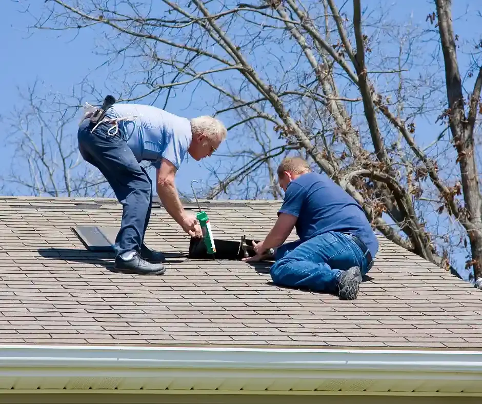 GRM Roofing contractors sealing a roof vent boot to prevent leaks on a residential roof in Little Egg Harbor, NJ