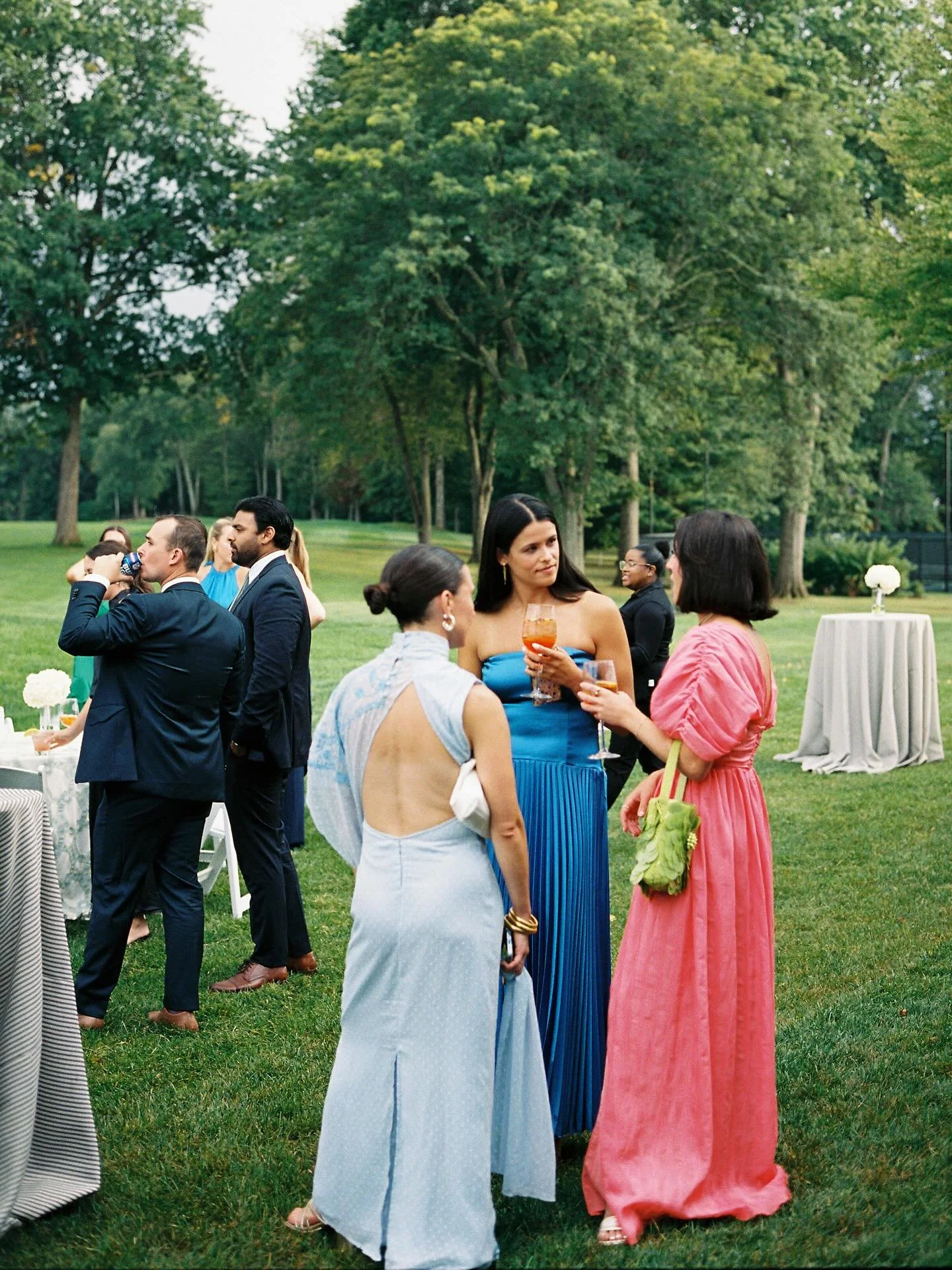 just loveeee getting film scans in my inbox 💗💚 still not over the random downpour we got on this day just before cocktail hour which led to the dreamiest post rain storm lighting 🌦️