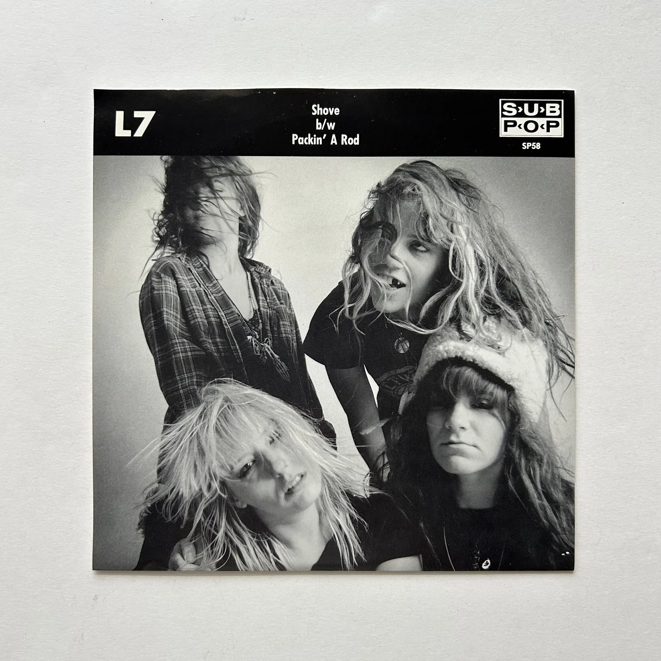 L7 - shove b:w packin' a rod.jpeg