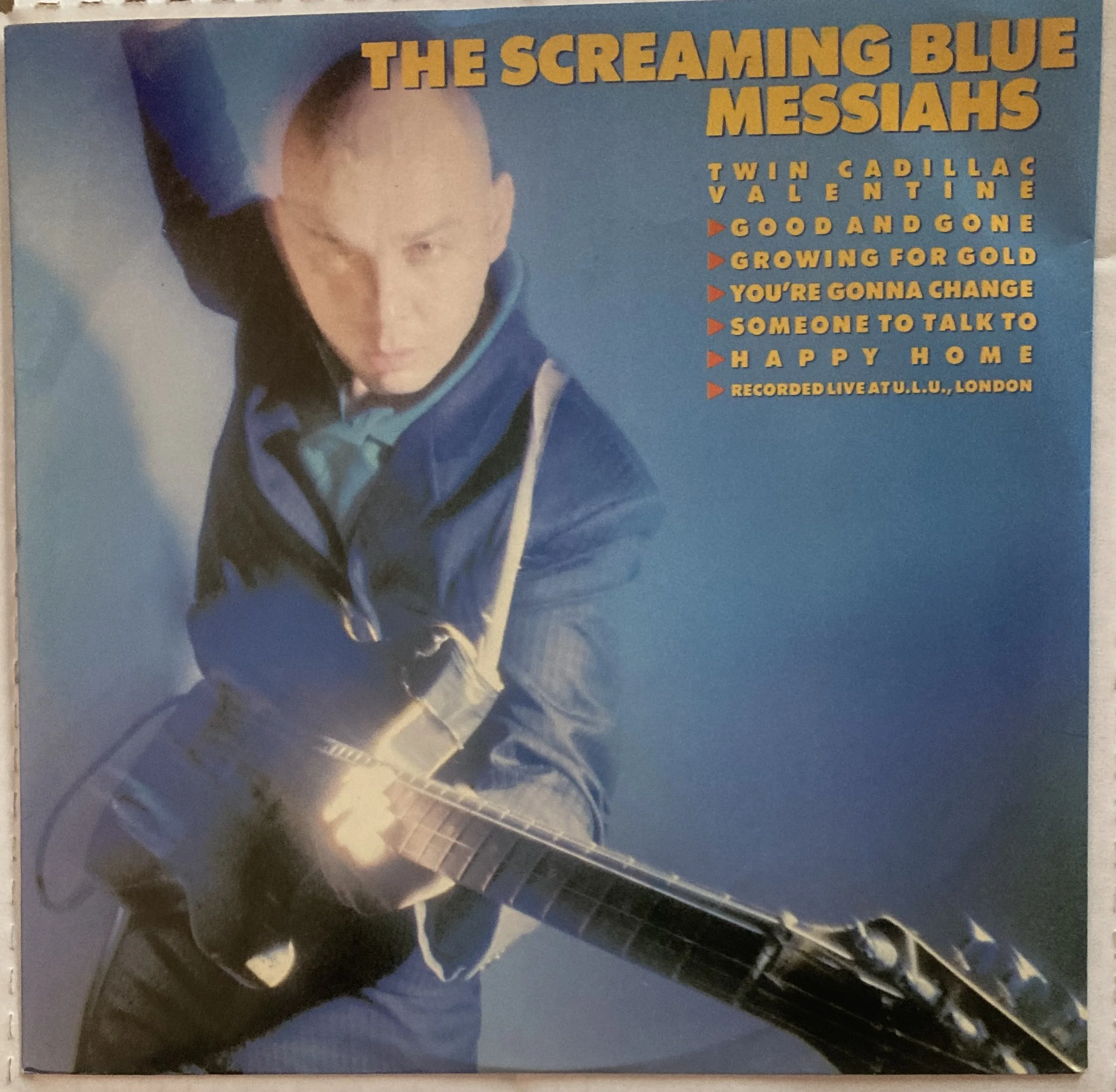 the screaming blue - twin cadillacs.jpg