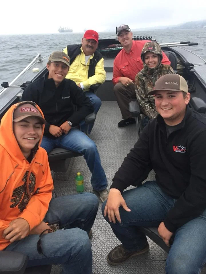 group in boat with fishing charter in Oregon