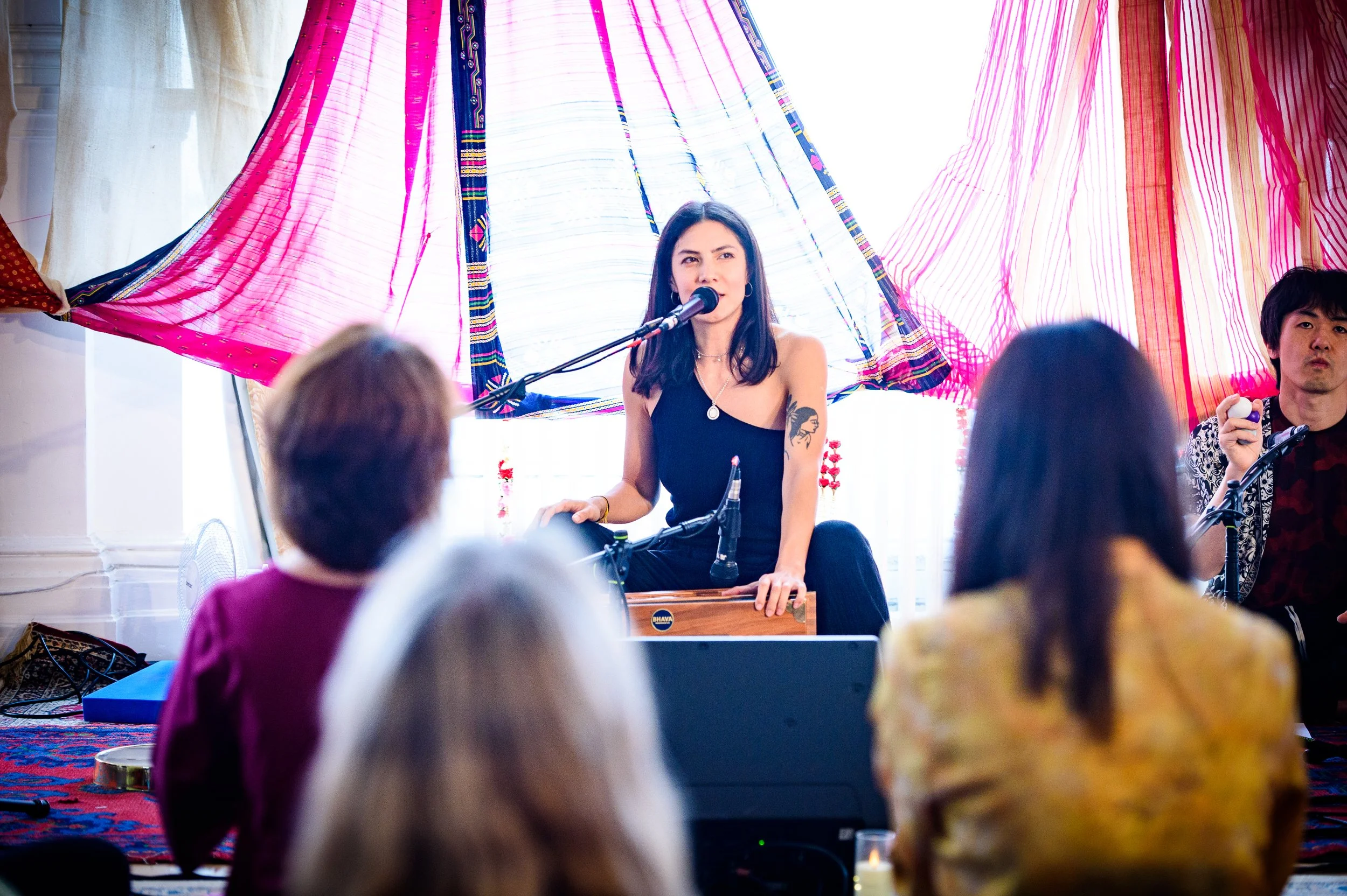 image of lisa playing harmonium
