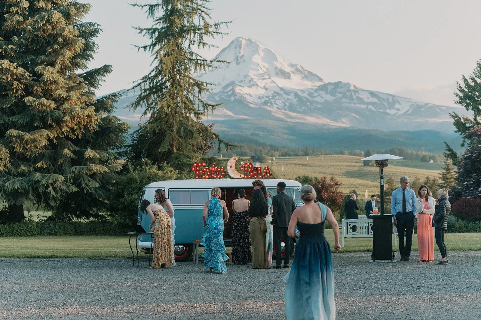 The FotoBus Co., a VW bus mobile photobooth in front of Mount Hood at Mt. Hood Organic Farms wedding venue.