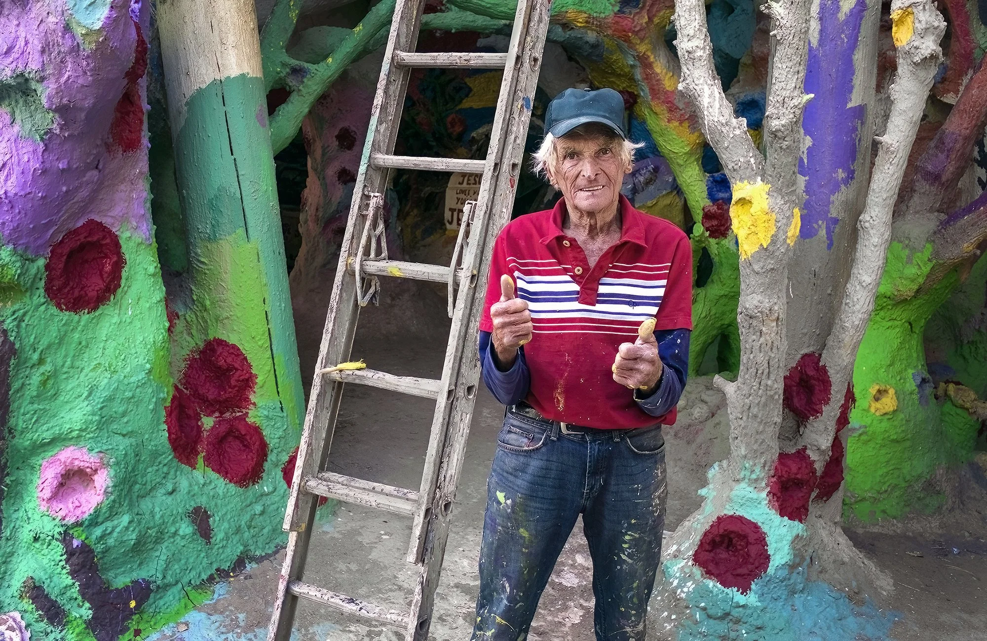 Leonard Knight giving two thumbs-up inside Salvation Mountain. Niland, California. 2010.