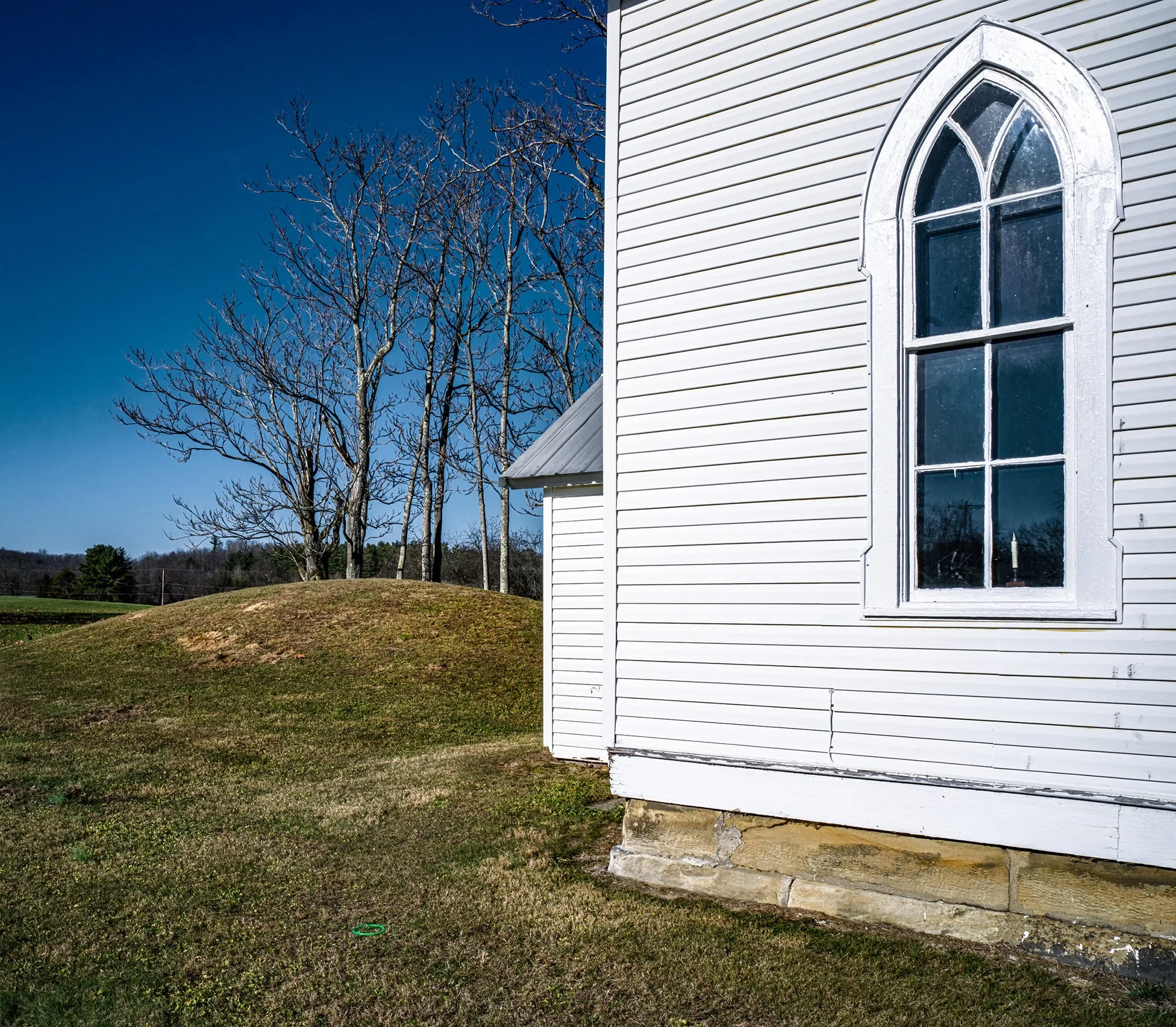 Adena mound behind Methodist church. Zaleski, Ohio. 2023.