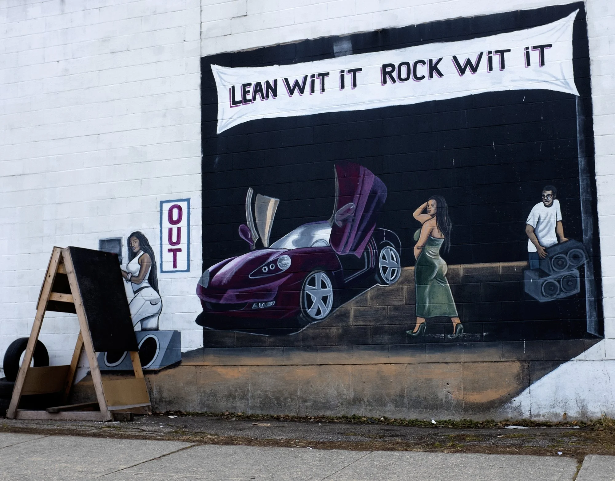 Tire shop sign, Ezzard Charles Drive, West End. 2015.