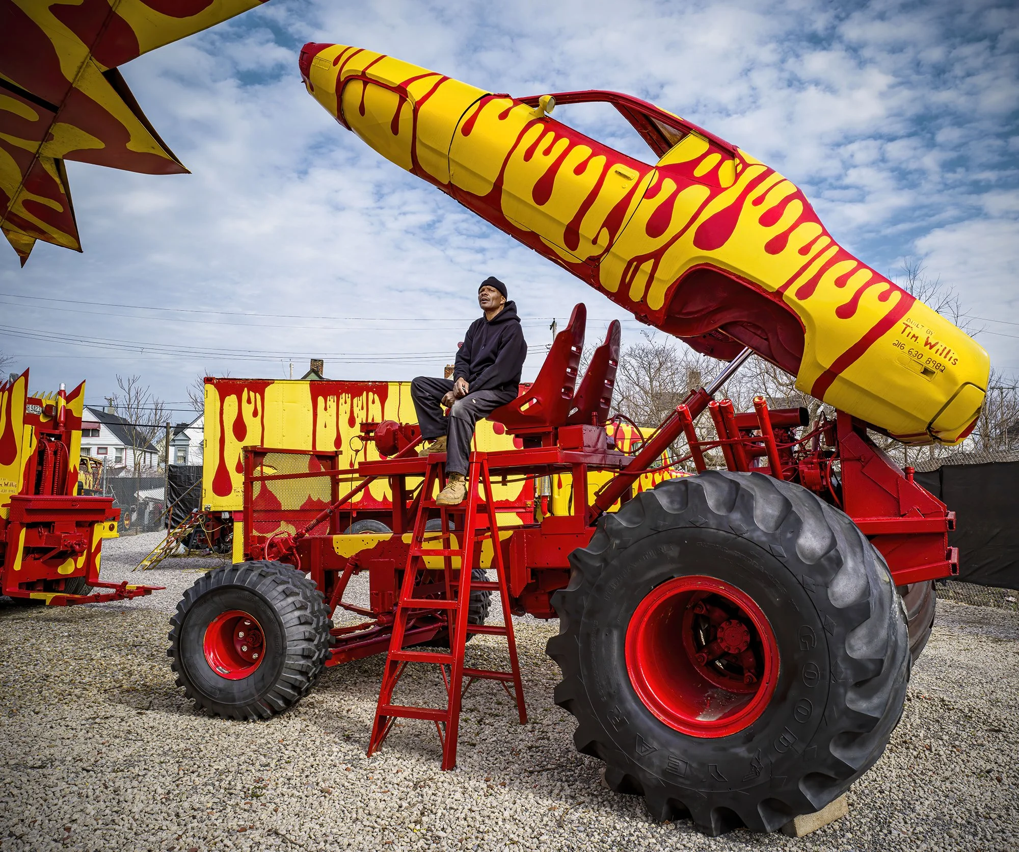 Tim Willis sits high atop one of his seventeen animated vehicles. Cleveland, Ohio. 2022.