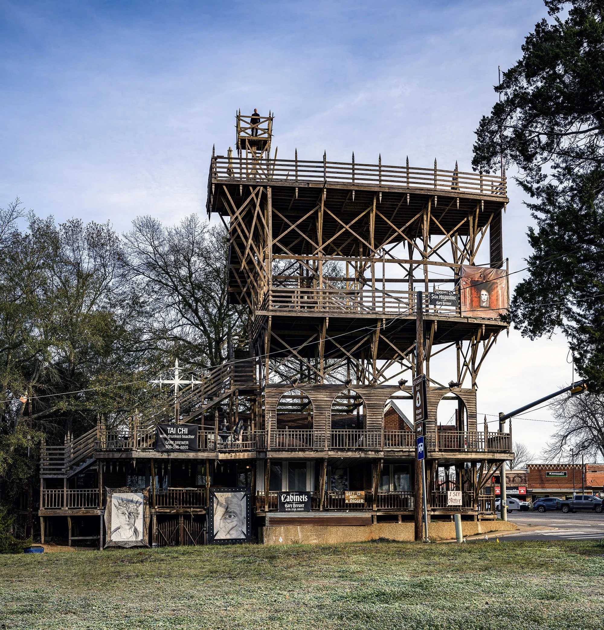 Gary Brewer, high atop his home. San Augustine, Texas. 2025.