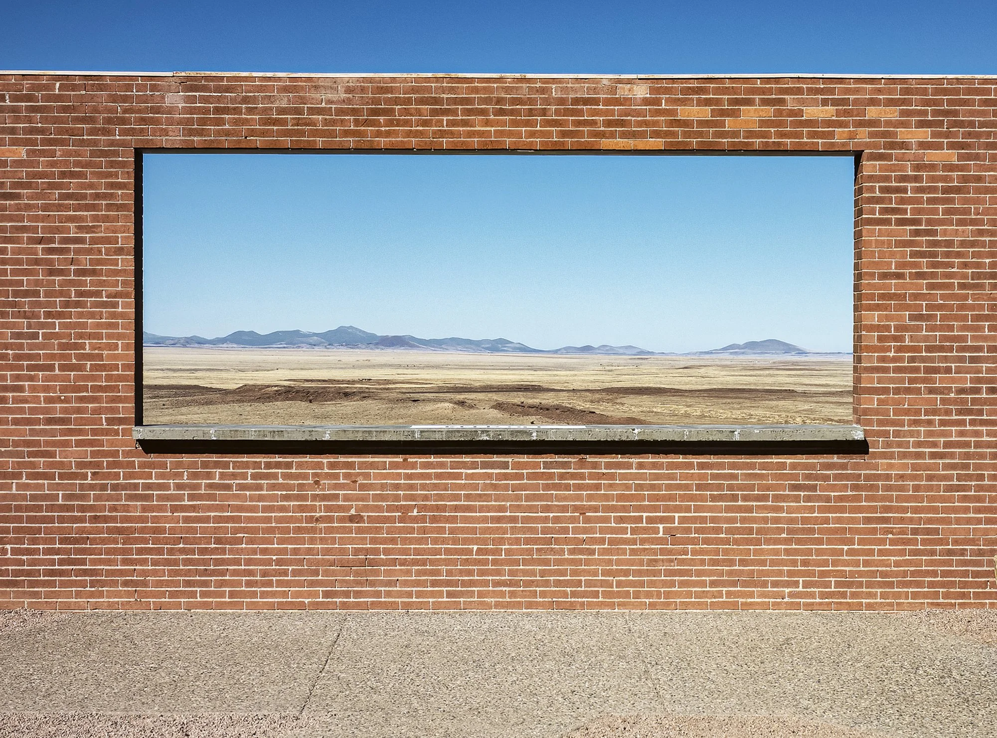Window in brick wall at Meteor Crater. Winslow, Arizona. 2009.