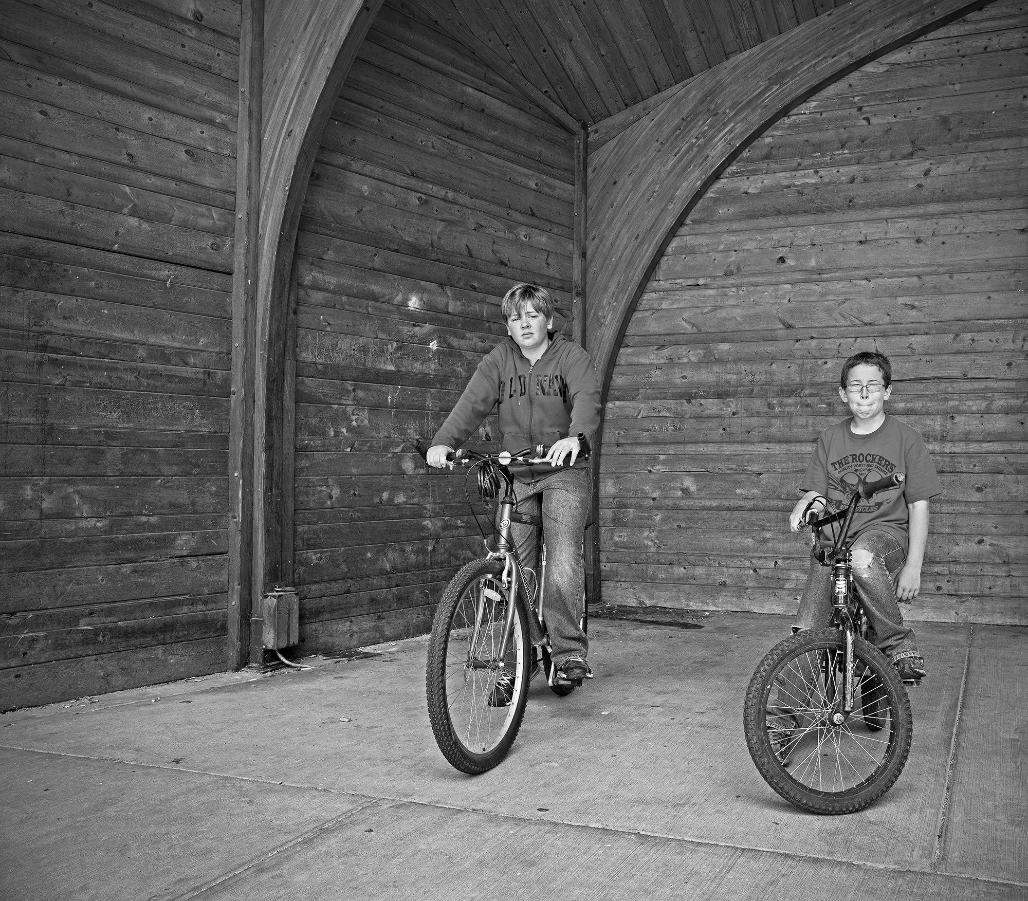 Two boys with bikes in the town bandstand. Powell, Wyoming. 2012.