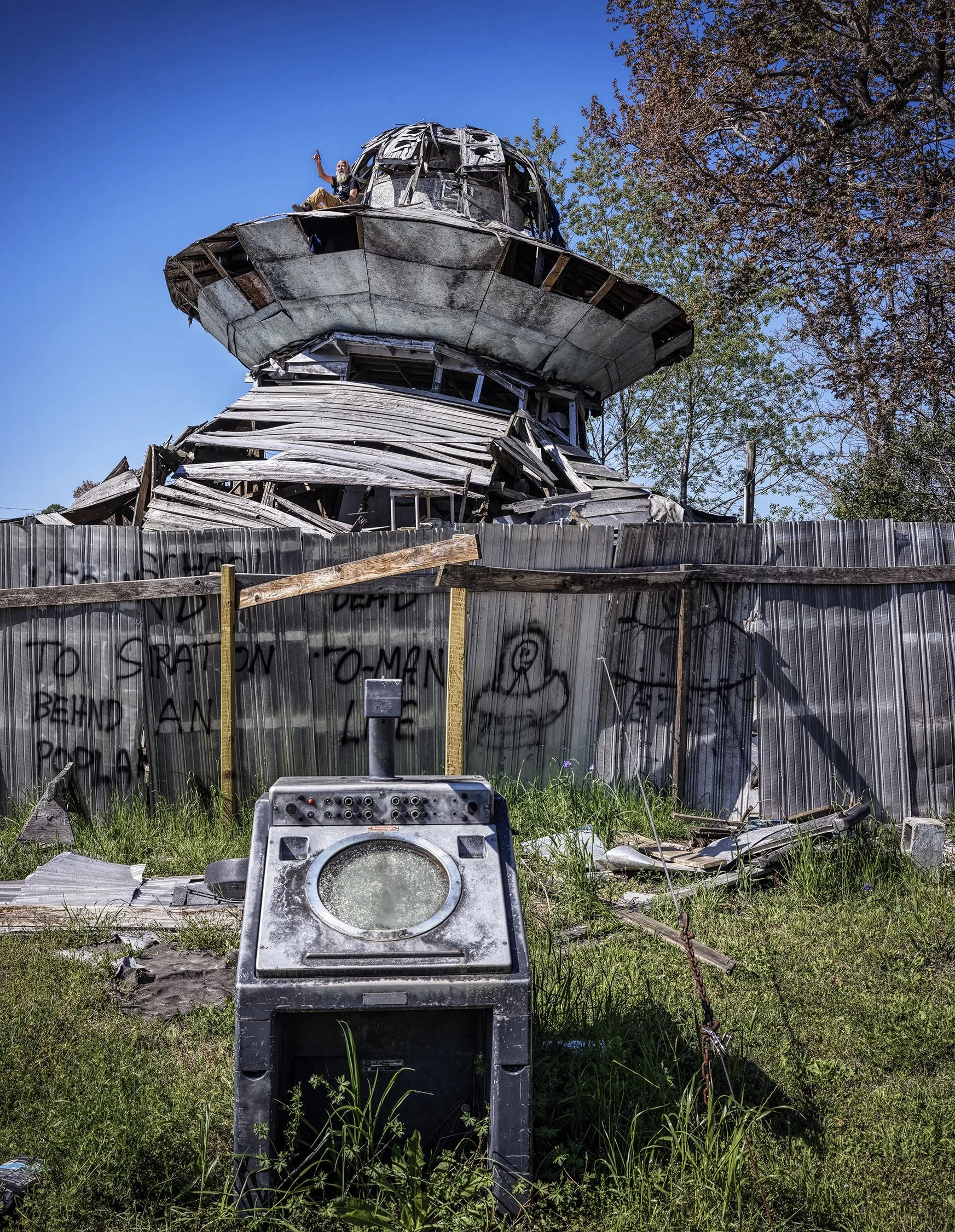 Jody Pendarvis, creator of the UFO Welcome Center, on the lookout for extraterrestrial activity. Bowman, South Carolina. 2024.