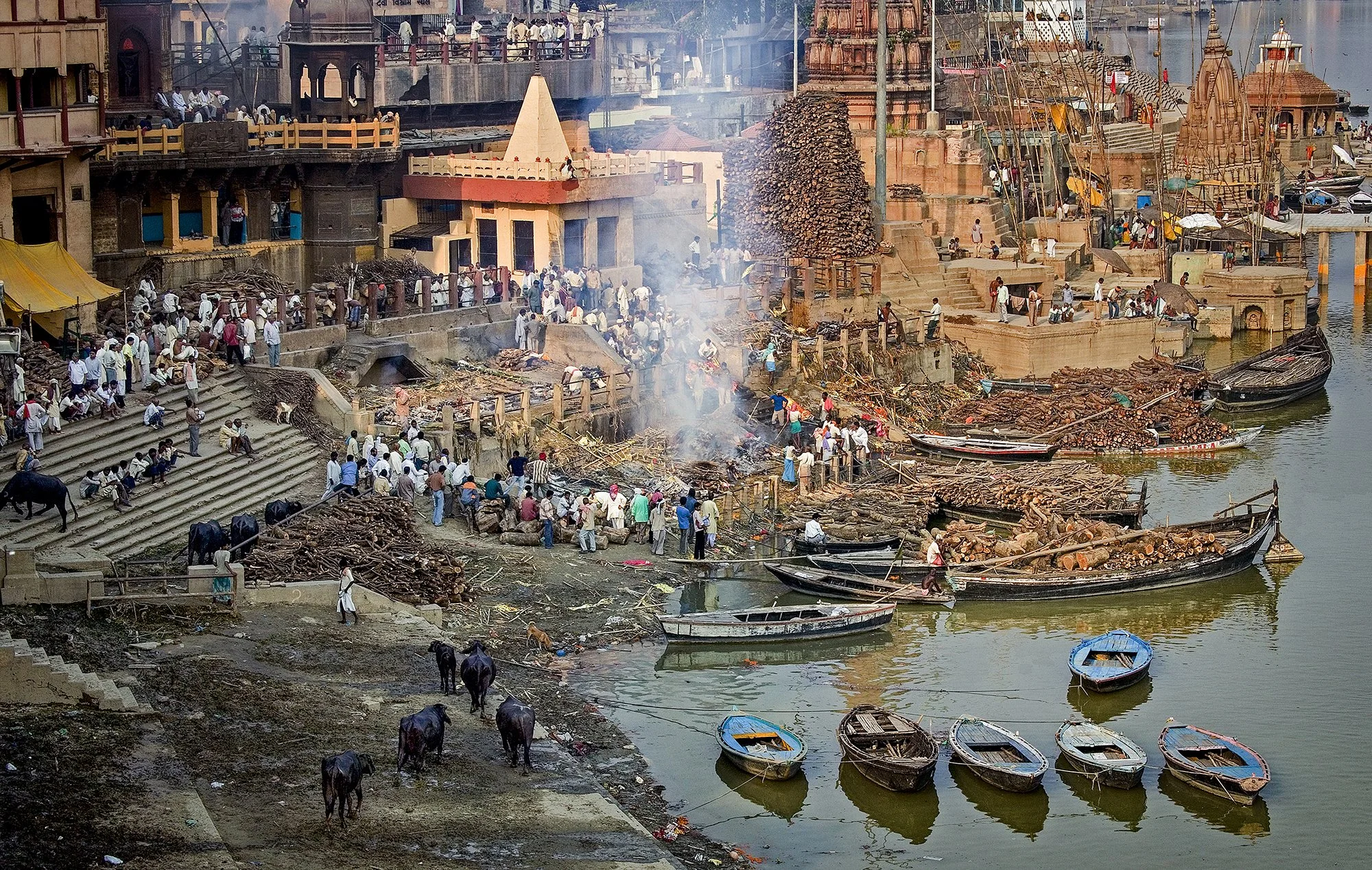 View of Manikarnika “burning” (cremation) ghat on the Ganges River. Varanasi.