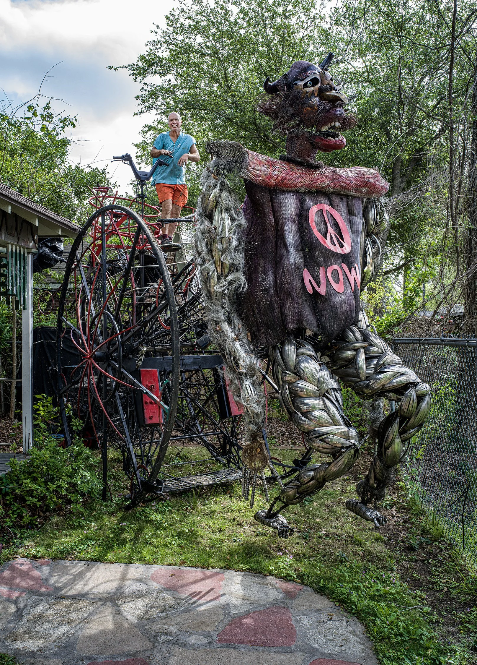 Mark “Scrapdaddy” Bradford riding his self-powered “Peacemaker-No War” sculpture. Houston, Texas. 2023.