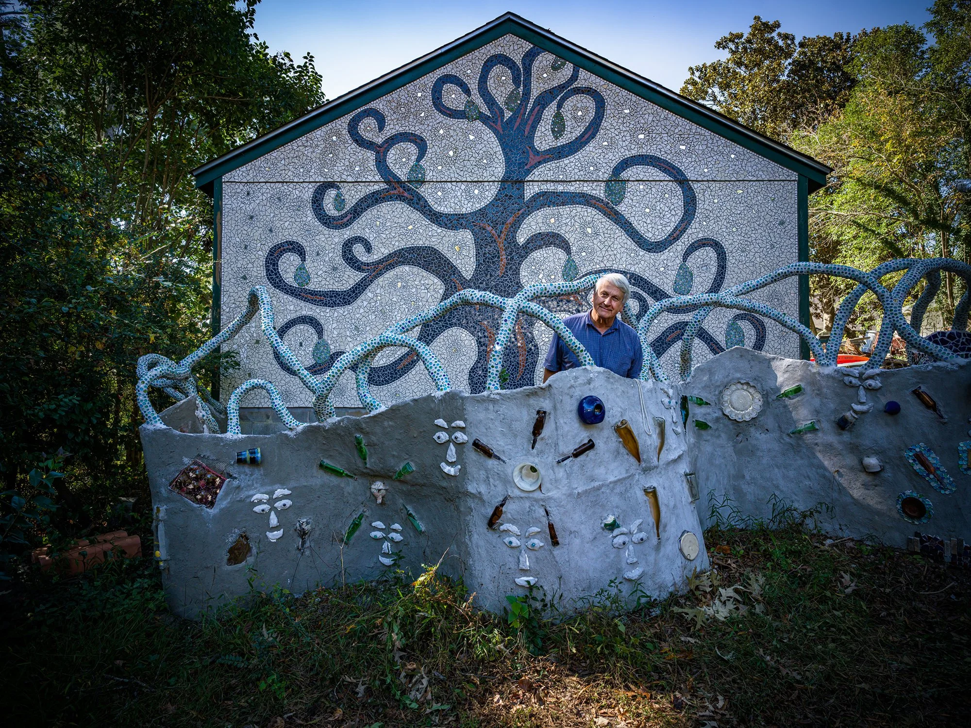 Gene Dillard in front of his Tree of Life mosaic. Durham, North Carolina. 2024.